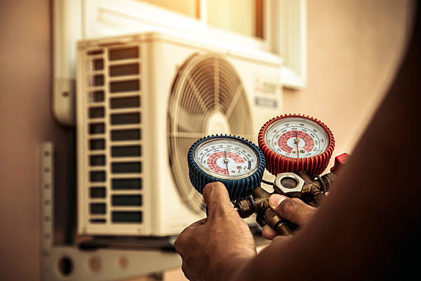Professional Heat Pump Repair technician working in Fillmore, CA